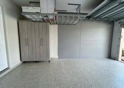 Thongoutiefip – Overhead rack, flooring, cabinets, slatwall (Parkland, Florida)