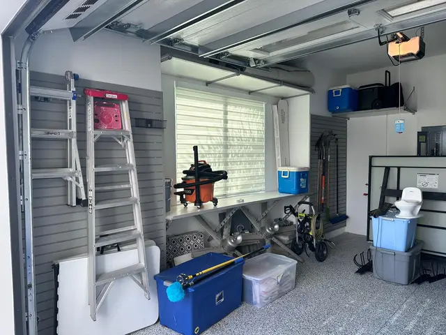 Garage slatwall storage wall by Garage-Tastic in West Palm Beach (photo 1)