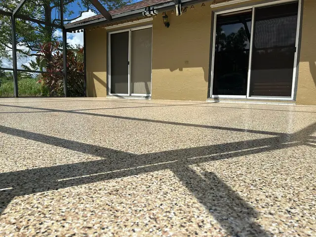 Pool deck epoxy coating by Garage-Tastic in West Palm Beach (photo 1)